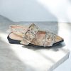 slingback flatjes spitse neus en gespen met shake print goud beige zijkant