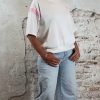 travelsweater off white met roze bies – vooraanzicht