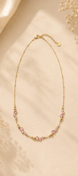 Ketting met roze/gouden strass bollen Sil - 182781