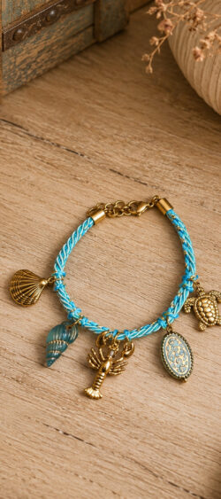 Ibiza koord armband turquoise met gouden bedels Sil - 187355