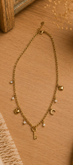 Ketting met sleutel en hartjes bedels goud Sil - 187528